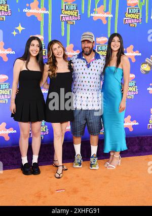 Santa Monica, California, USA. 13th July, 2024. (L-R) Sadie Sandler, Jackie Sandler, Adam Sandler and Sunny Sandler attend Nickelodeon Kids' Choice Awards 2024 at Barker Hangar on July 13, 2024 in Santa Monica, California. Credit: Jeffrey Mayer/Media Punch/Alamy Live News Stock Photo