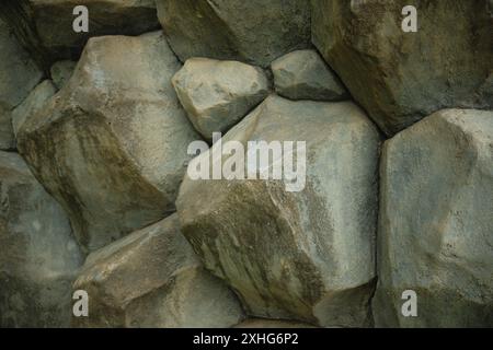 A formation of large rocks made from artificial natural stone Stock Photo
