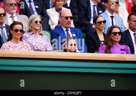 Pippa Middleton, Princess Charlotte and the Princess of Wales in the royal box on day fourteen of the 2024 Wimbledon Championships at the All England Lawn Tennis and Croquet Club, London. Picture date: Sunday July 14, 2024. Stock Photo