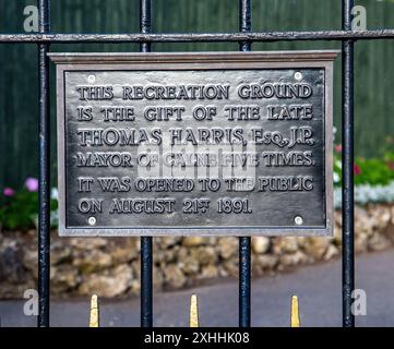 Plaque on iron gate commemorating the gift of a recreation ground by Thomas Harris, Esq. opened August 21st, 1891. Stock Photo