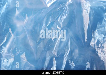 Close-up of wrinkled blue plastic background Stock Photo