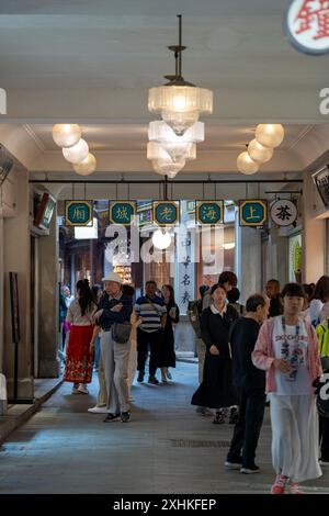 Shanghai, June 06, 2024: Tourist visit to Yuyuan Bazaar in Shanghai. This is bustling energy of Shanghai's most famous commercial street Stock Photo