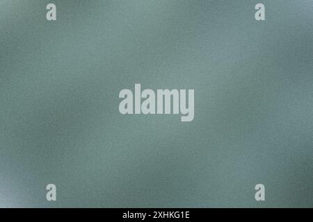 Brushed metal texture background with a green hue Stock Photo