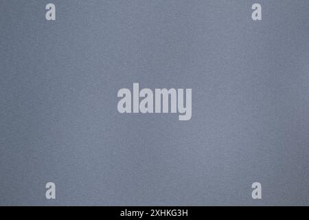 Grainy textured background in shades of gray providing a subtle pattern and visual interest Stock Photo