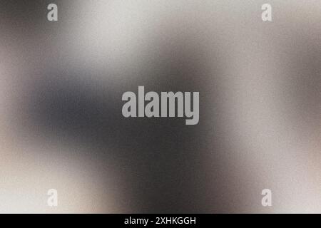 Blurred abstract gradient background in gray and white tones with grainy texture Stock Photo