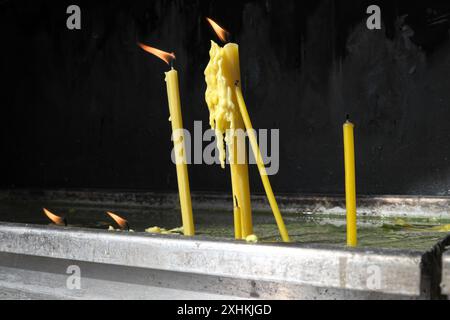 lighted candles, Holy Trinity Serbian Orthodox Church in Gornji Milanovac, Sumadija, Serbia Stock Photo