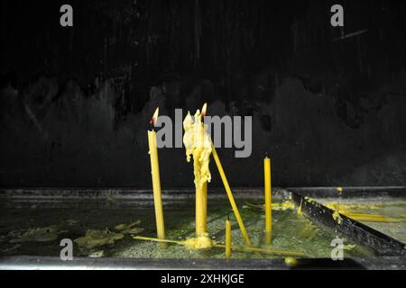 lighted candles, Holy Trinity Serbian Orthodox Church in Gornji Milanovac, Sumadija, Serbia Stock Photo