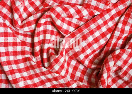 Red and white checkered plaid table cloth as background Stock Photo