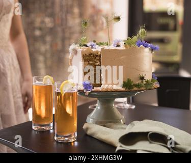 Cut Wedding Cake with Drinks on Table Stock Photo