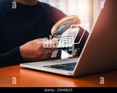 Electronic document check and data information searching online, files manager concept. The right documents file icon appear on magnifying glass in bu Stock Photo