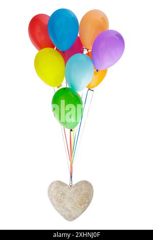 Stone heart hanging on a set of colorful balloons isolated on a white background Stock Photo
