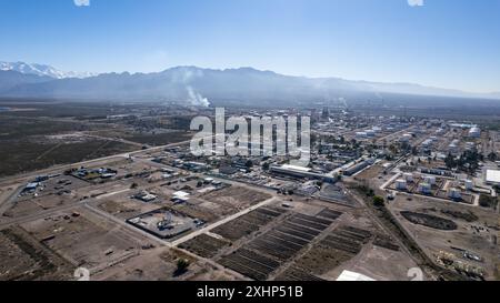 Lujan de Cuyo industrial park, Mendoza. Snowy Andes mountain range. Stock Photo