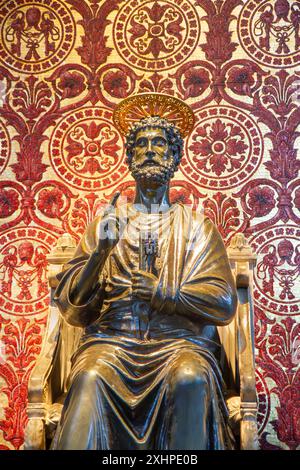 The bronze statue of Saint Peter holding the keys of heaven. St. Peter's Basilica, Vatican City, Rome, Italy. Stock Photo