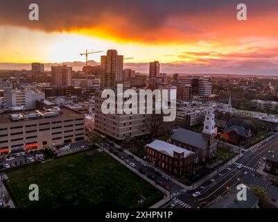 Aerial view of New Brunswick business downtown in New Jersey with stunning colorful sunset sky Stock Photo