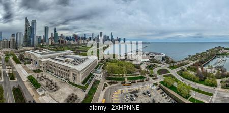 Aerial view of the Art Institute of Chicago renowned  art museum in Millennium Park with modern playground, skating path, Butler field, skyscrapers Stock Photo