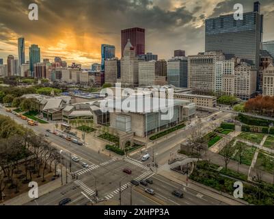 Aerial view of the Art Institute of Chicago renowned  art museum in Millennium Park with stunning colorful sunset sky Stock Photo