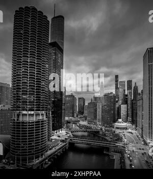 Aerial view of iconic high-rise buildings along the Chicago river on the magnificent mile with dramatic sky Stock Photo