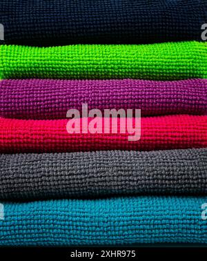 A stack of multicolored, microfiber cloths, for cleaning Stock Photo