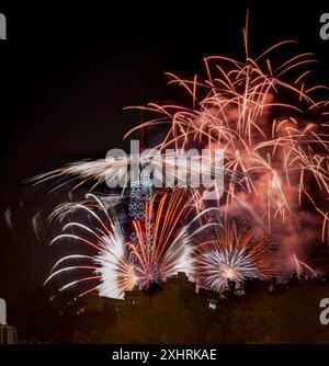 Paris, France - 07 14 2024: July 14 fireworks fired from The Eiffel Tower in Paris Stock Photo
