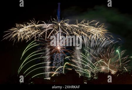 Paris, France - 07 14 2024: July 14 fireworks fired from The Eiffel Tower in Paris Stock Photo