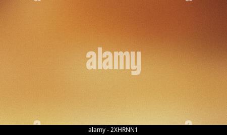 Gold gradient background featuring a subtle grain texture Stock Photo
