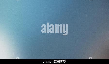 Blurred blue gradient background with grainy texture creating an abstract effect Stock Photo