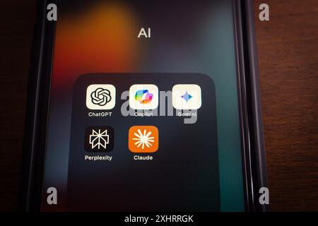 ChatGPT, Microsoft Copilot, Google Gemini, Perplexity and Claude icons seen on an iPhone. Artificial Intelligence, Generative AI Chatbot Concept Stock Photo