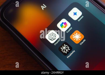 ChatGPT, Microsoft Copilot, Google Gemini, Perplexity and Claude icons seen on an iPhone. Artificial Intelligence, Generative AI Chatbot Concept Stock Photo