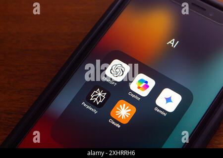 ChatGPT, Microsoft Copilot, Google Gemini, Perplexity and Claude icons seen on an iPhone. Artificial Intelligence, Generative AI Chatbot Concept Stock Photo