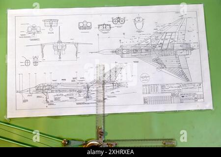 Vintage 1950s technical blueprint of an aircraft design, Avro Arrow, with measurements and drafting tools at the Avro Museum in Calgary Alberta Canada Stock Photo