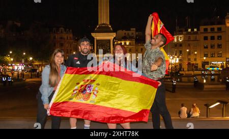 Spanish Fans celebrate Spain's win over England in the Euro finals at Trafalgar Square. Trafalgar Square (Central London), United Kingdom. Stock Photo