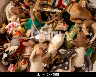 Assorted cute Felted animals gathered in a basket. Many different kinds of animal are represented. High quality photo Stock Photo