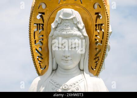 Sanya, China Statue of the goddess Guanyin on the territory of Nanshan buddhist culture park, Hainan island Stock Photo