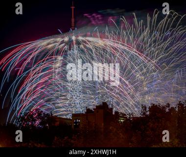 Paris, France - 07 14 2024: July 14 fireworks fired from The Eiffel Tower in Paris Stock Photo