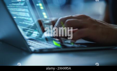 Software Programmer Working on Computer, Engineering Neural Network, Creating Machine Learning App, Doing Big Data Analysis, Optimizing AI. Edited Projection Overlayes Screen. Focus on Hands Stock Photo