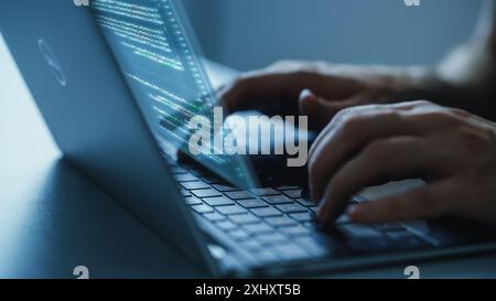 Software Programmer Working on Computer, Engineering Neural Network, Creating Machine Learning App, Doing Big Data Analysis, and Optimizing AI. Edited Projection Overlayes Screen. Focus on Hands Stock Photo