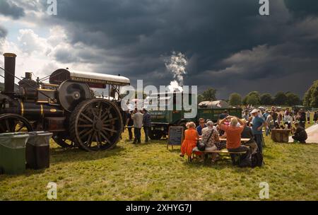 Storrington / UK - Jul 13 2024: A vintage steam traction engines and  steam trucks on display at Sussex Steam Rally. Stock Photo