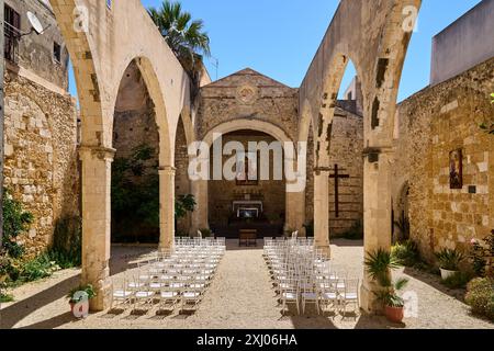 Outdoor Wedding Ceremony Setup in Historic Church Ruins Stock Photo