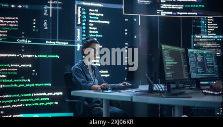 Portrait of Woman Working on Computer, Typing Lines of Code that Appear on Big Screens Surrounding her in Dark Monitoring Room. Female Programmer Creating Innovative Software Using AI Data and System Stock Photo