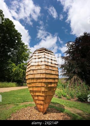 Wooden sculpture in the garden at Burghley House, Stamford, England. Stock Photo