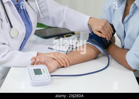 A heart patient attended a hospital for a checkup with a doctor after experiencing chest pain. Doctors are advising patients to take care of their hea Stock Photo