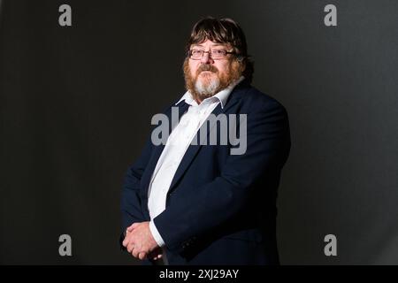 Edimburgh, Scotland. 20 August, 2018. Scottish writer John Burnside attends a photocall during the Edinburgh International Book Festival Stock Photo