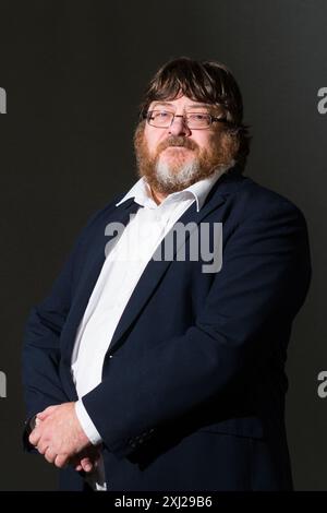 Edimburgh, Scotland. 20 August, 2018. Scottish writer John Burnside attends a photocall during the Edinburgh International Book Festival Stock Photo