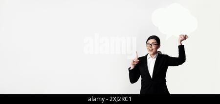 Businesswoman Holding Thought Bubble Stock Photo