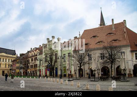 Old buildings in the Small Square ( Piata Mica ) formerly known as craftsmen market in Sibiu, Romania Stock Photo