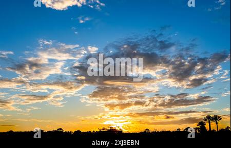 Colorful yellow orange sunset over southwestern Florida USA Stock Photo