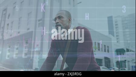 Image of graphs, letters, changing numbers, senior african american man riding bicycle in city. Digital composite, multiple exposure, report, business Stock Photo