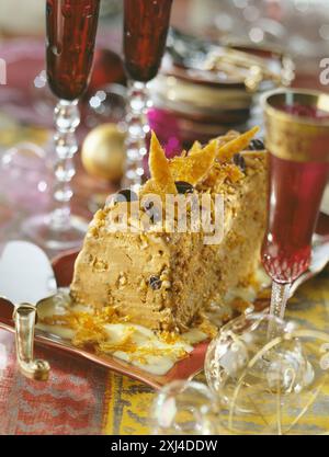 Coffee,fudge and nougatine iced log Stock Photo