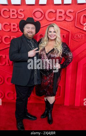 Actor PAUL WALTER HAUSER and wife AMY ELIZABETH BOLAND walk the red
