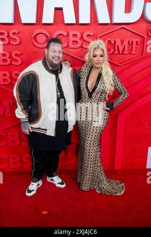 Singer JELLY ROLL and wife ALYSSA DeFORD walk the red carpet and pose
